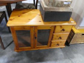 Modern pine entertainment unit with glazed doors