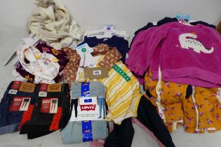 Bag of childrens clothing incl. clothing sets by Pekkle and Carters with shorts and jeans by Levi's