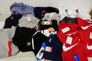 +VAT Approx. 16 items of branded clothing incl. t-shirts, shorts, tracksuit bottoms and jumpers by