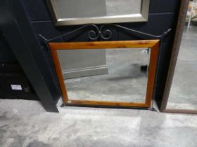 Black wrought metal and pine framed and beveled rectangular wall mirror