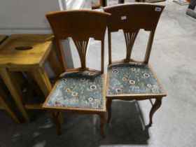 Pair of dark oak framed blue floral upholstered dining chairs