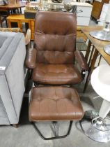 Brown leatherette upholstered easy chair on metal frame with matching footstool