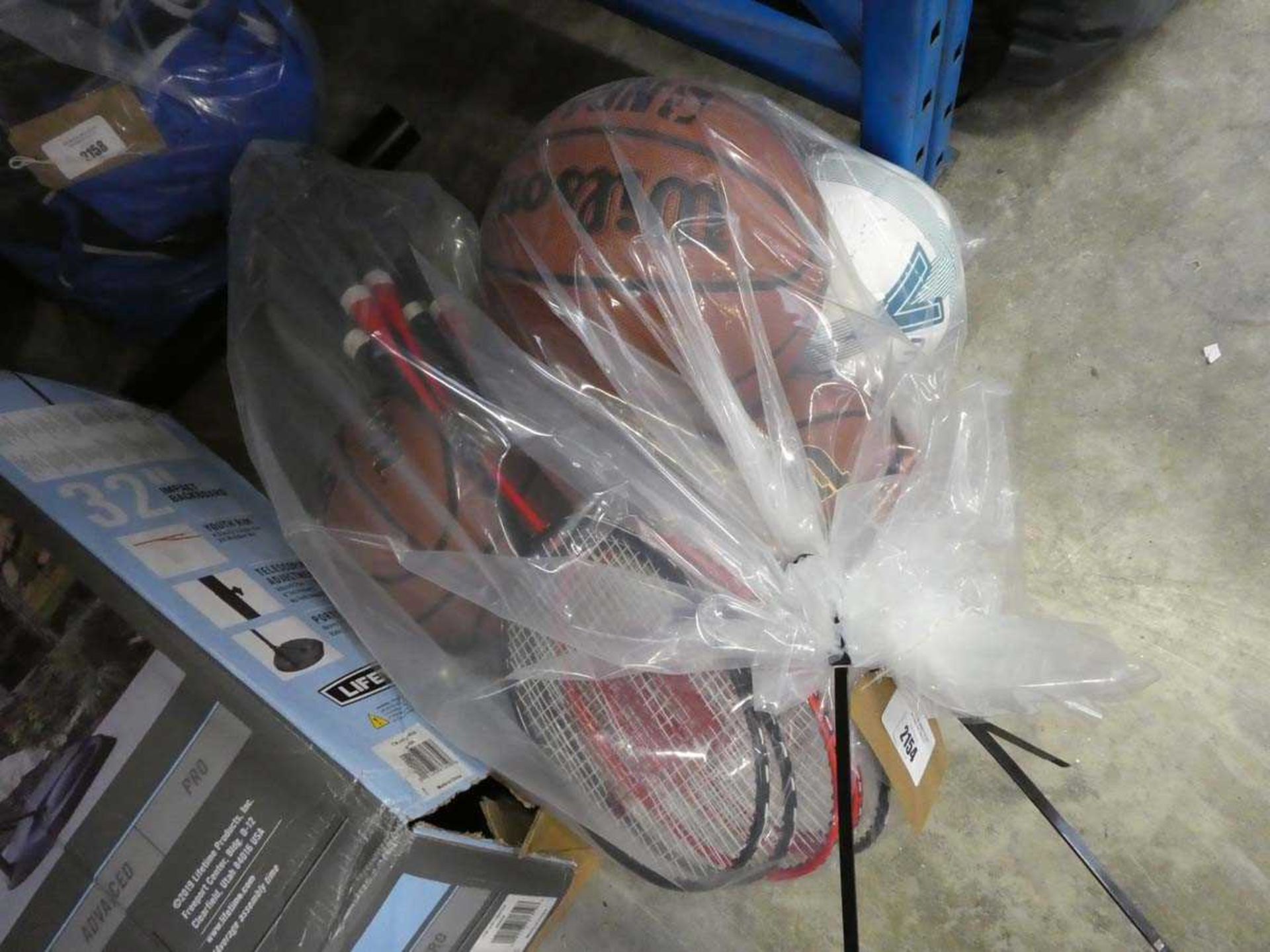 +VAT 2 bags containing 3 Wilson branded basketballs, 2 Mitre footballs and a quantity of Wilson