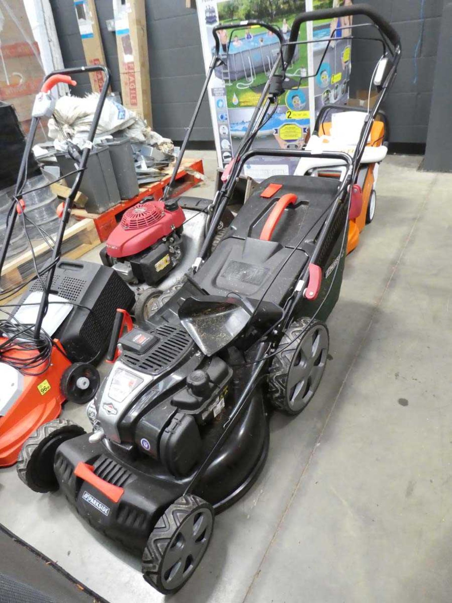 Parkside petrol powered rotary mower with grass box and battery start