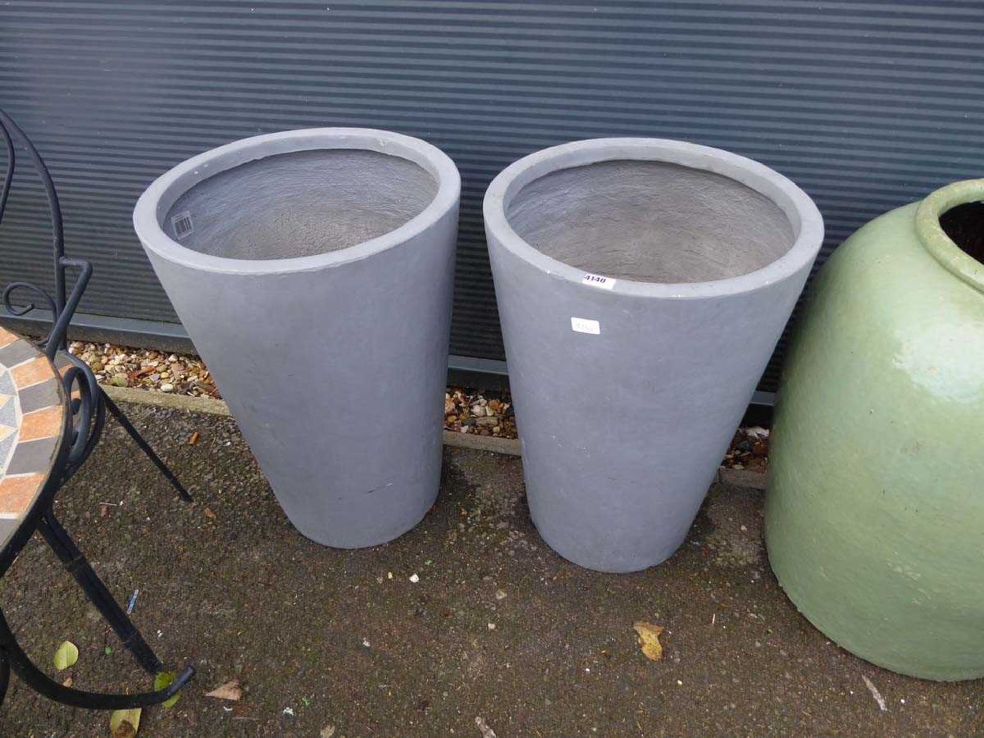 Two large grey pots