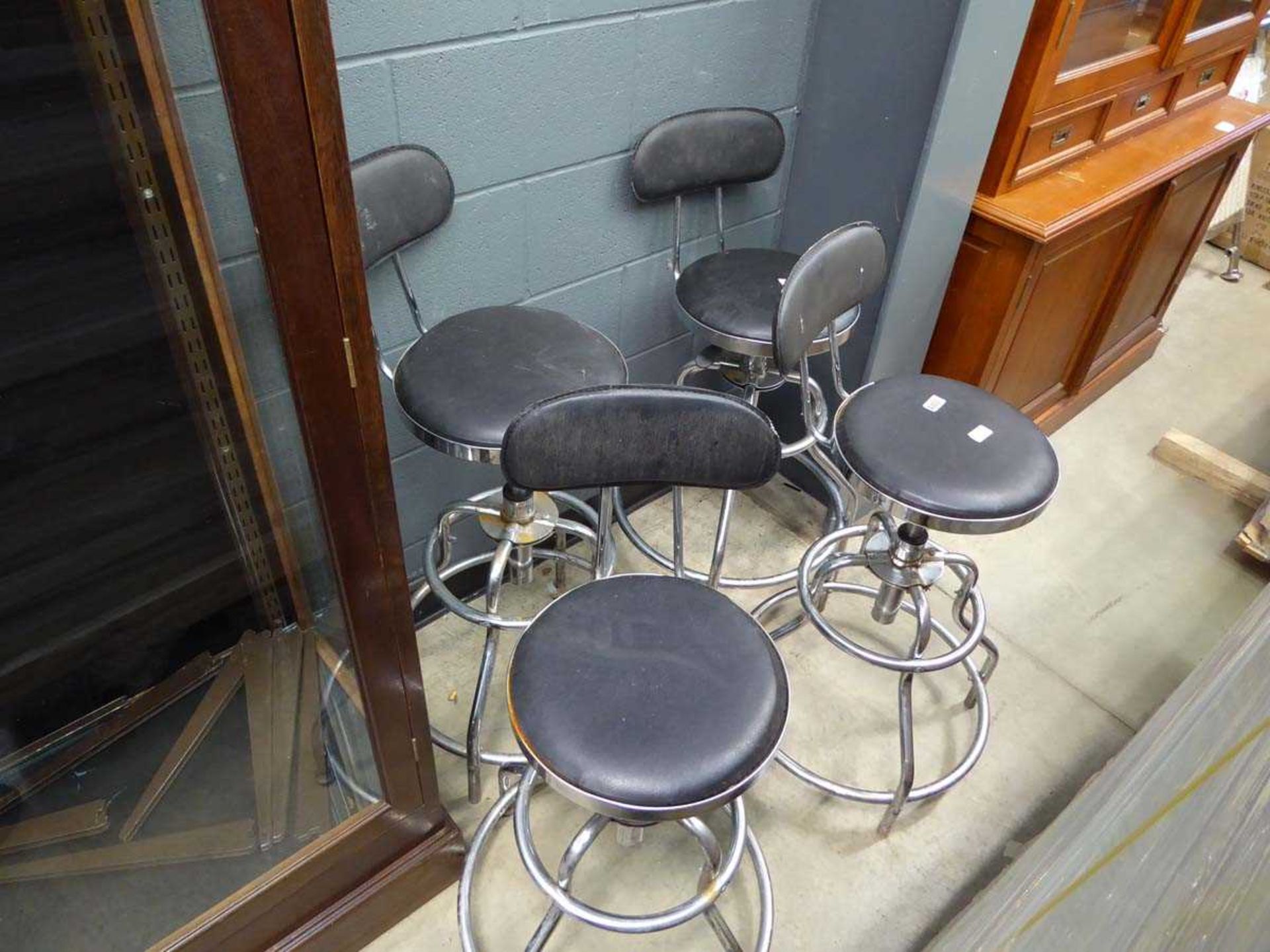 4 black chrome based stools