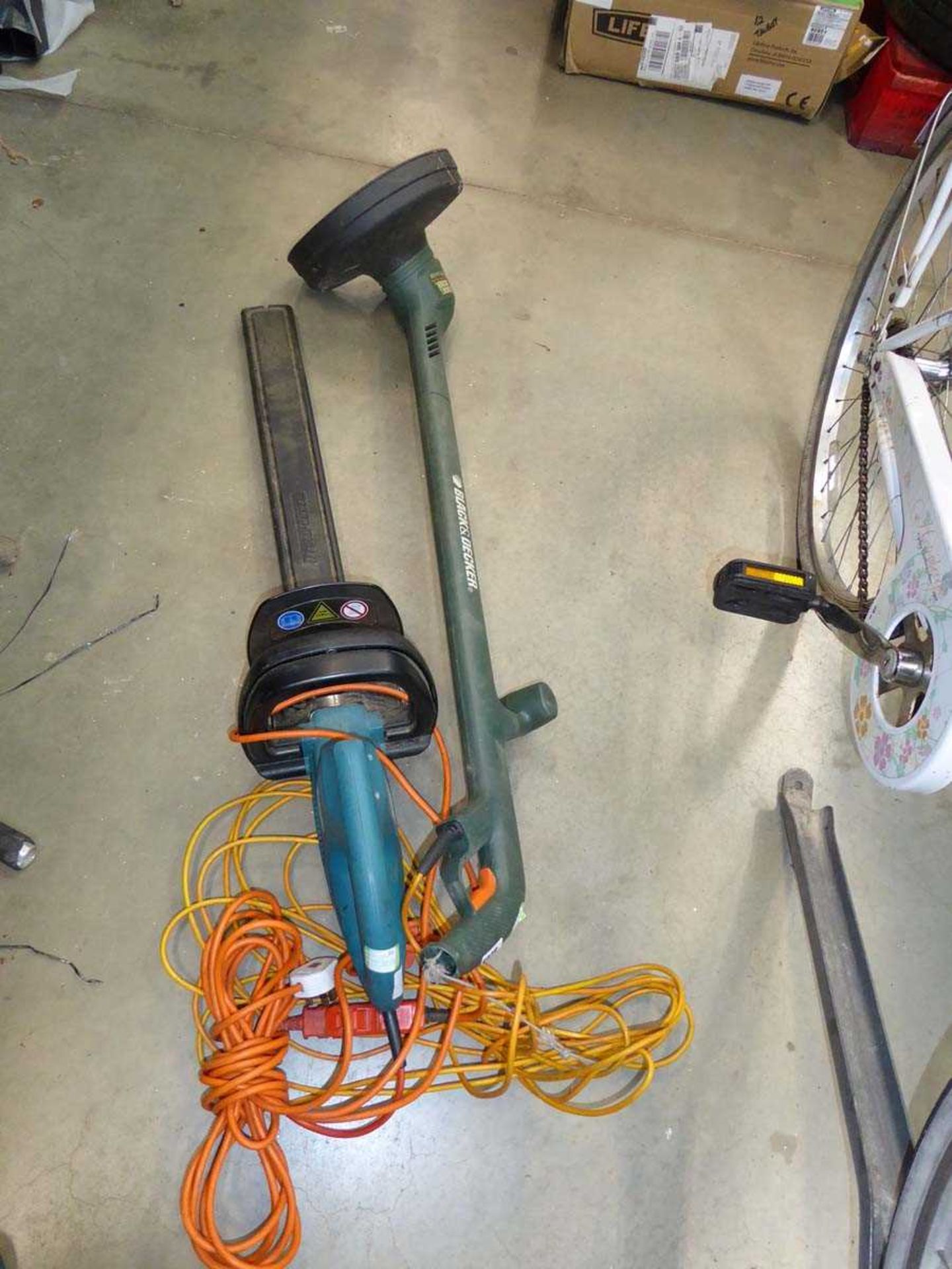 Electric strimmer and Makita electric hedge cutter