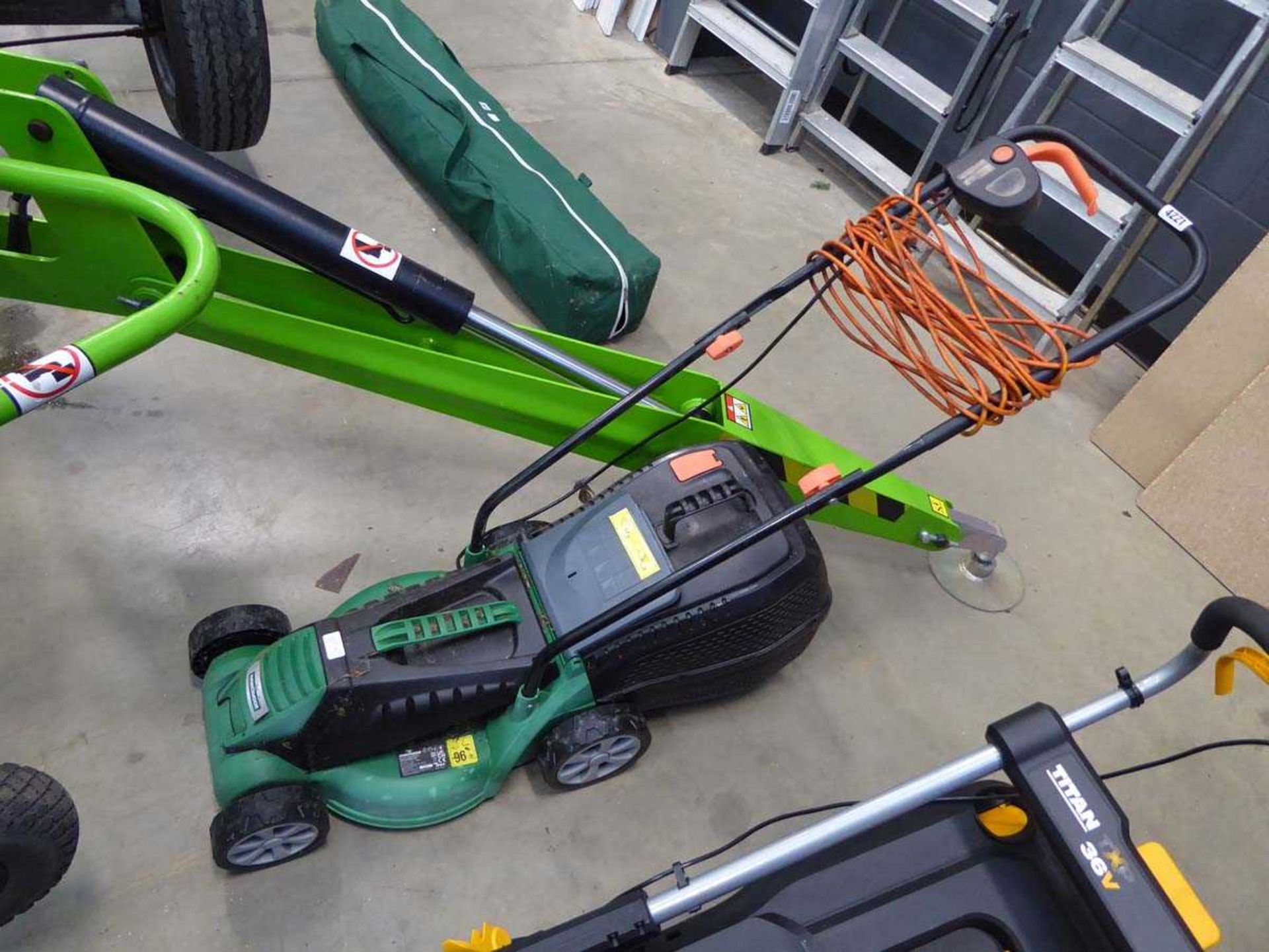 Small green Hawksmoor electric mower