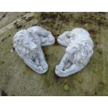 Pair of white recumbant lion statues