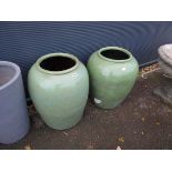 Two large tall oval pots