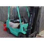 Mitsubishi model FG18 Calor gas counterbalance forklift truck with triple mast and pair of forks,
