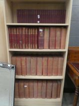 Four shelves containing quantity of Punch volumes