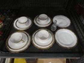 Cage containing quantity of gold rimmed Parisian trios, plus two side plates and sauce bottle
