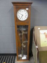 Master electric clock in oak case
