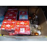Box of assorted Christmas decorations and crackers