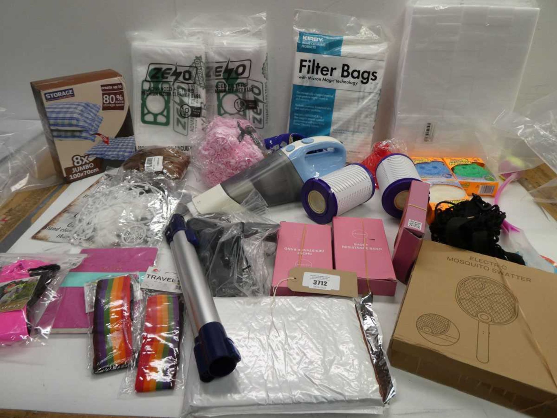 +VAT Mixed bag including Vacuum dust bags, storage bags, magic cleaning foam, resistance bands,