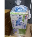 Bag containing items inc. garment steamer, mops