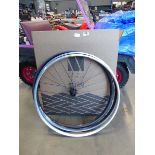 A bike wheel and 2 bike rims