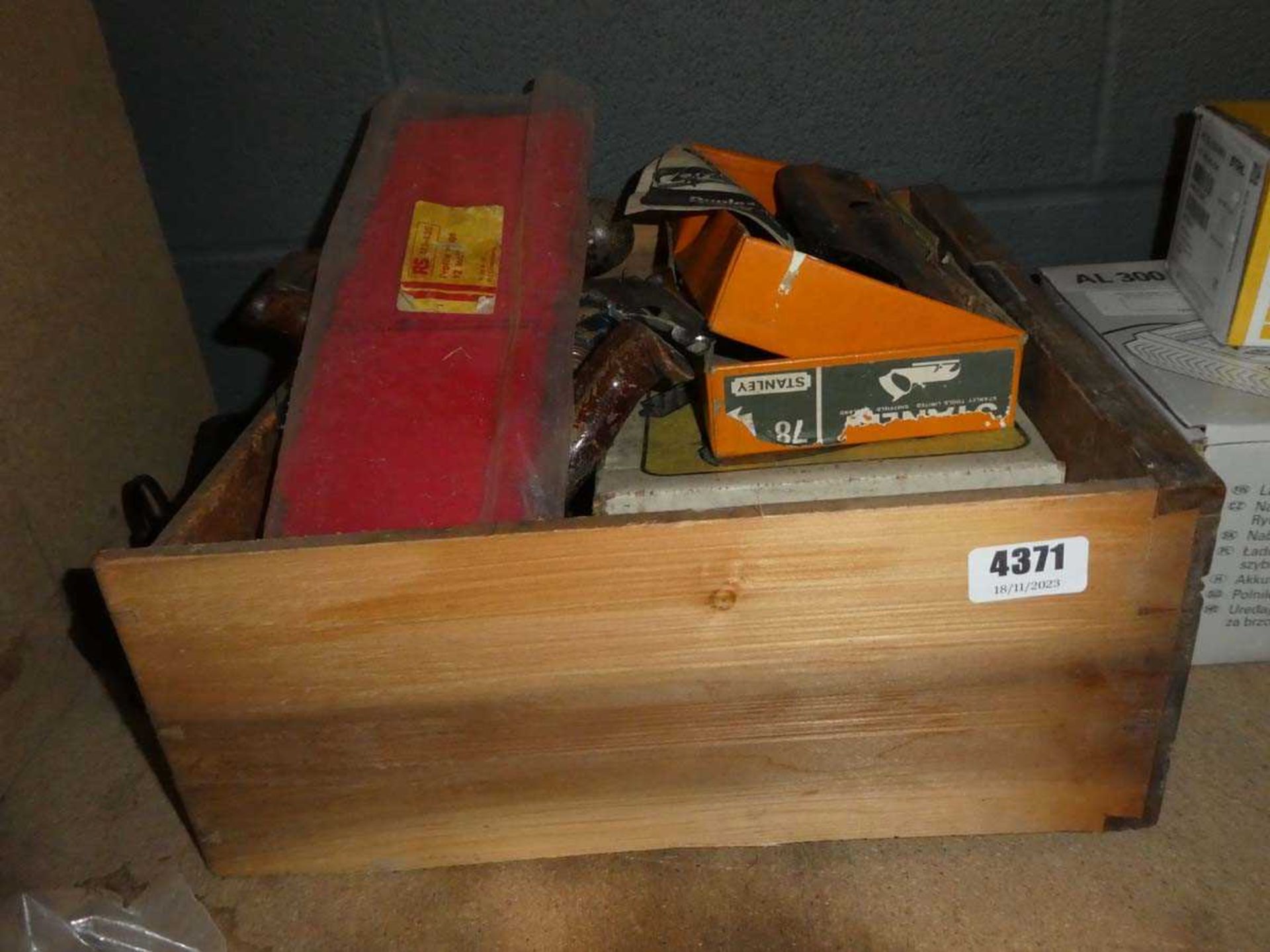 Drawer containing wood planes and various other wood working items
