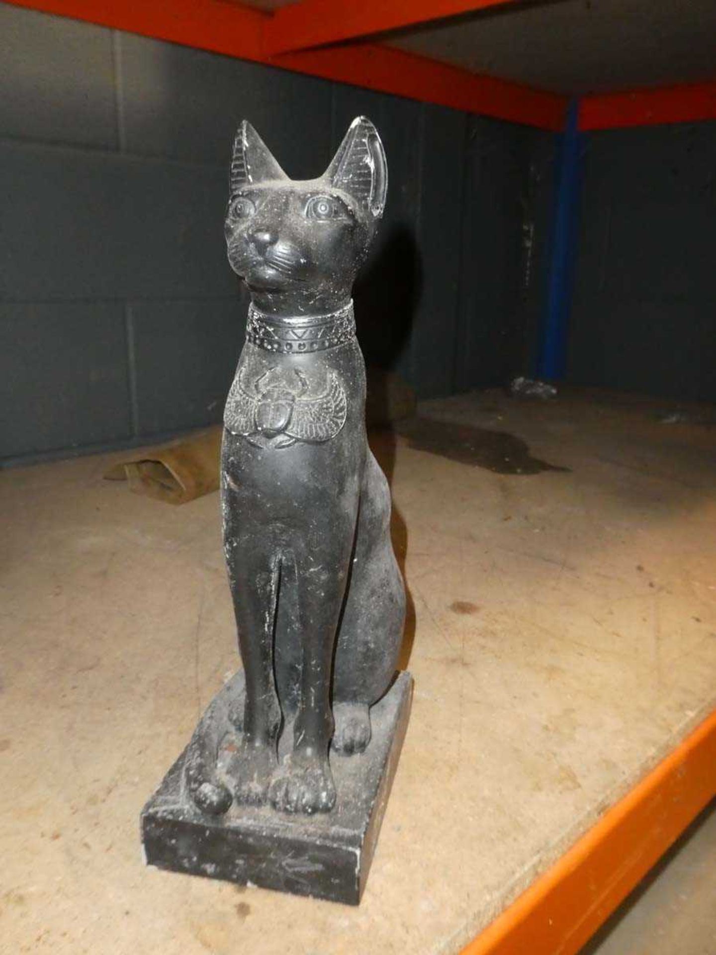 Small black statue of a cat