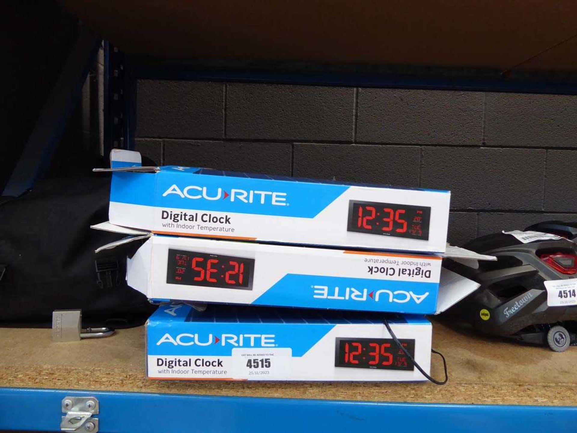 +VAT 3 boxed Acurite digital clocks and a tyre inflator