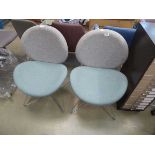 2 green and grey cloth chairs