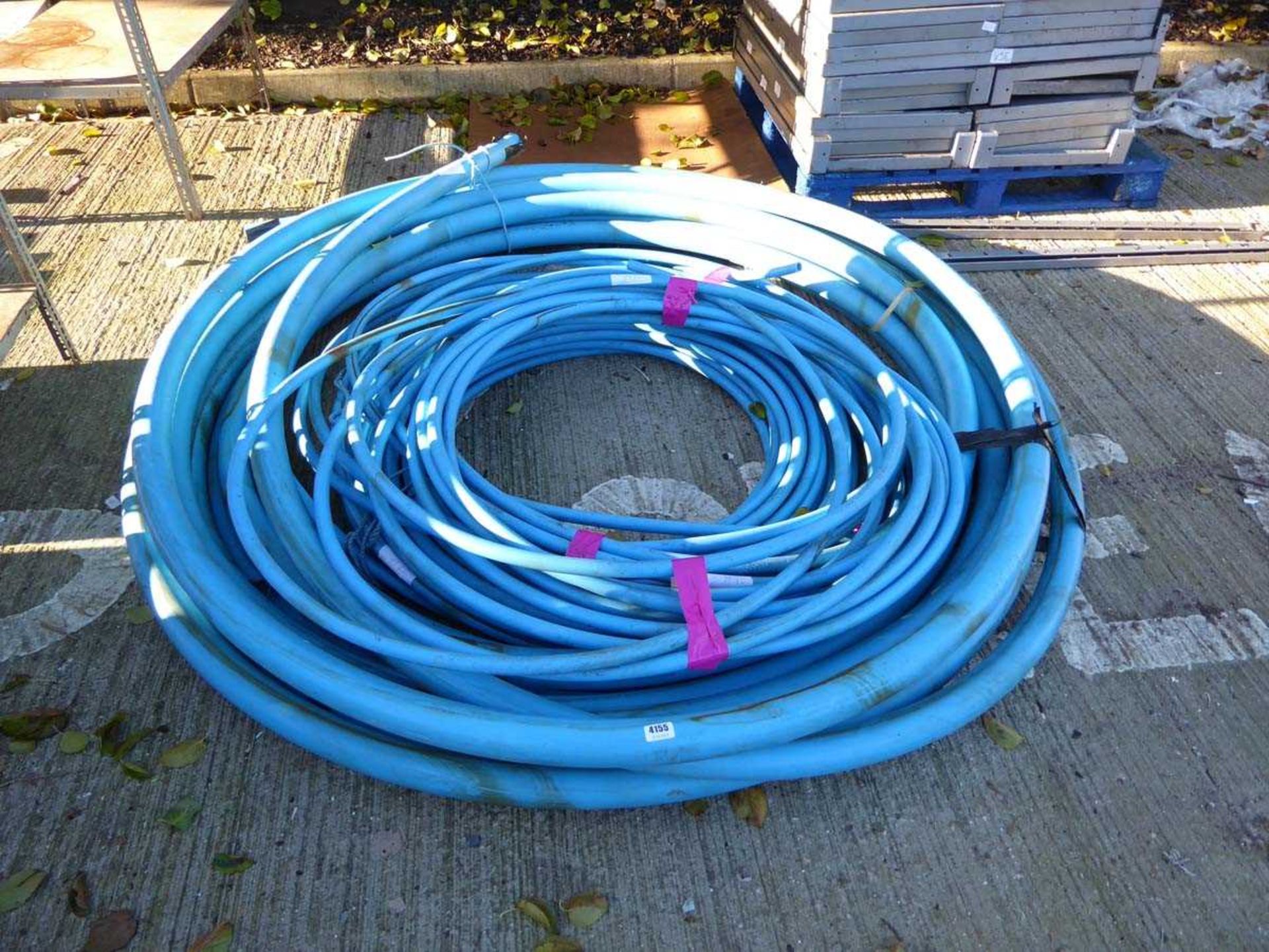 Large quantity of blue plastic pipe