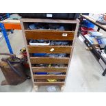 Set of wooden drawers with various assorted hinges, fixings, door stops, locks, etc