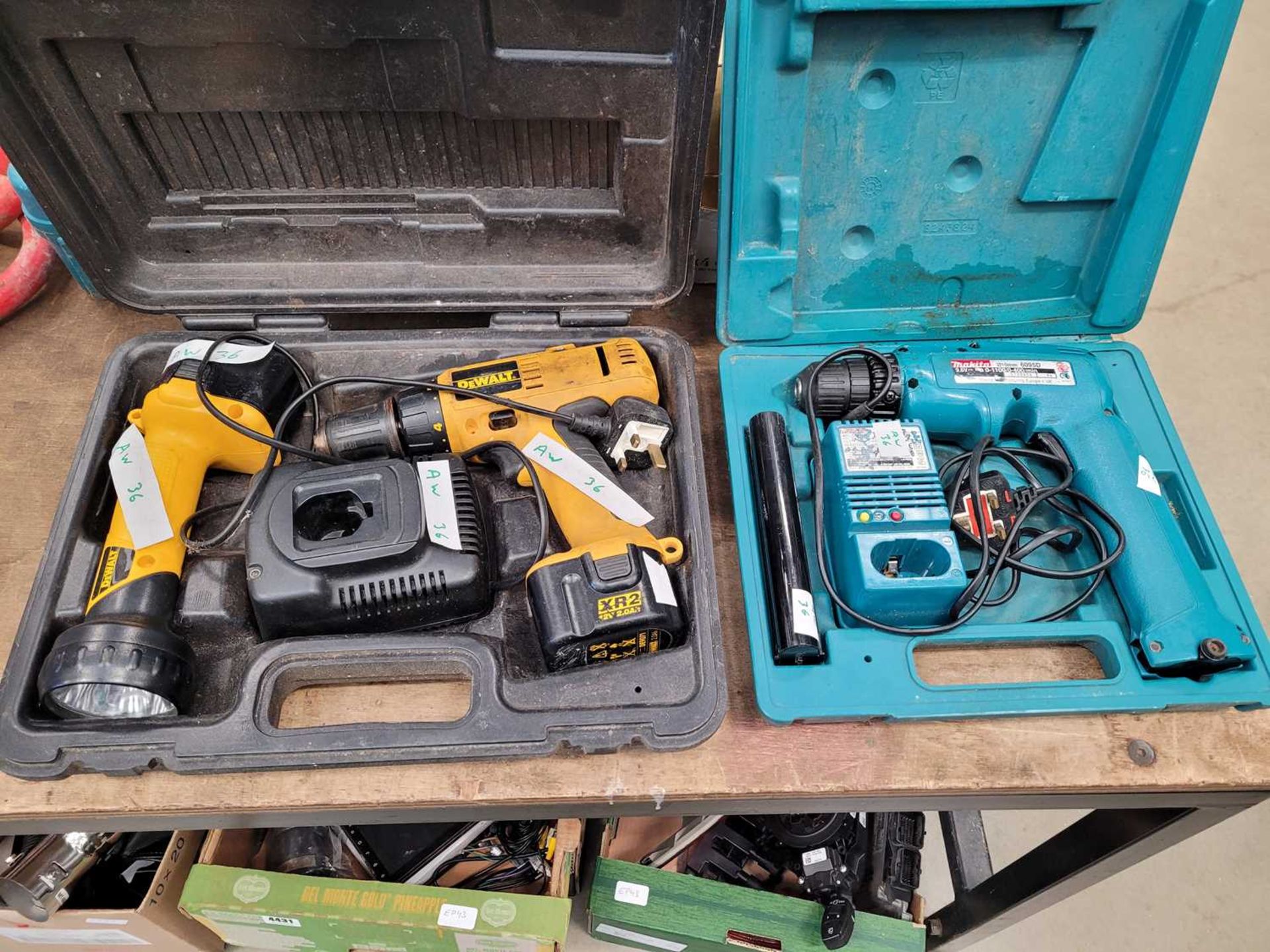 Dewalt battery drill with torch, 2 batteries and charger and a Makita small drill with 2 batteries