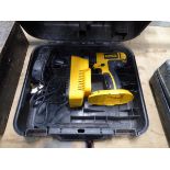 DeWalt drill in Black + Decker box with one battery and charger, and spirit level