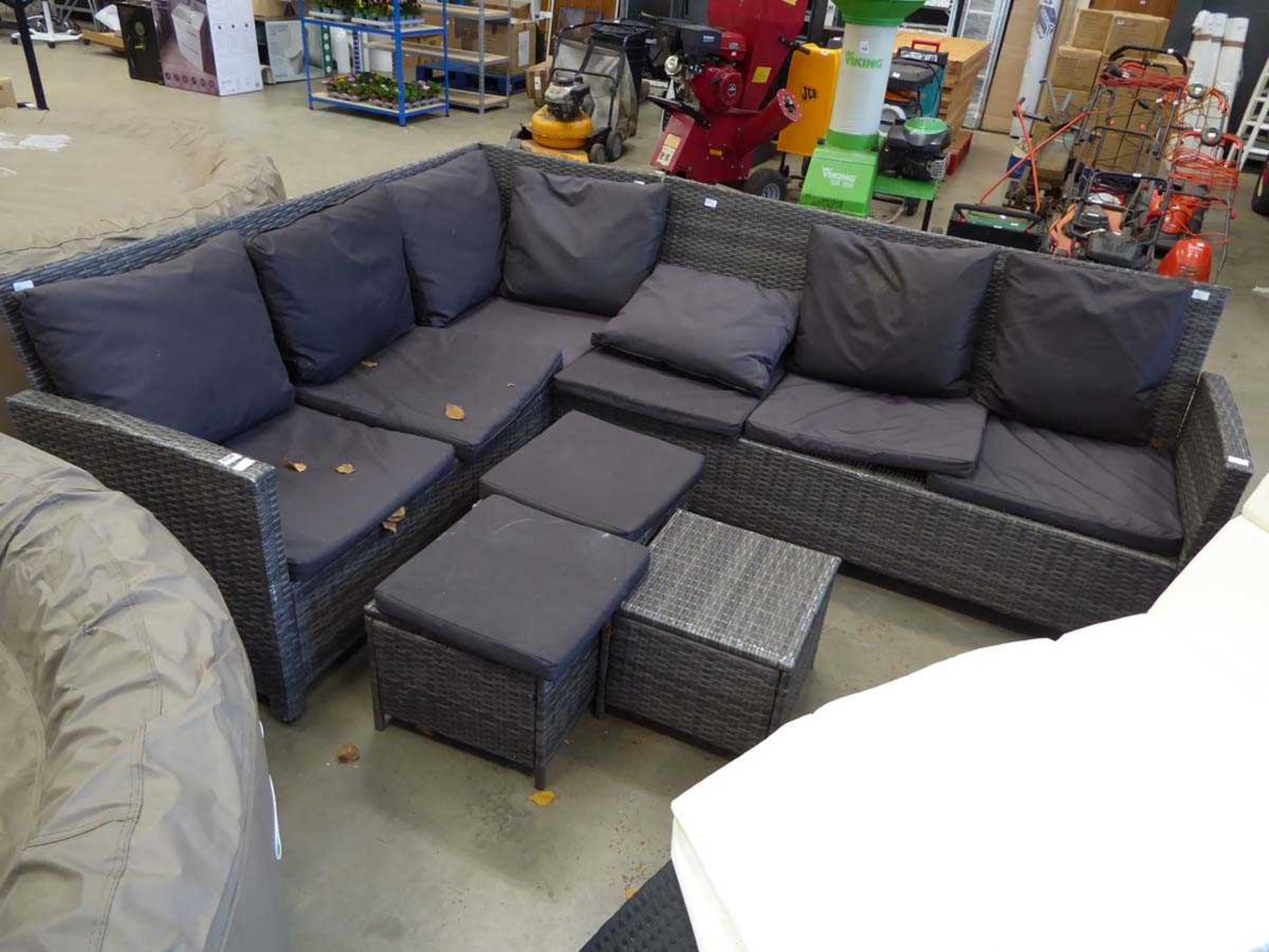 Rattan corner sofa with footstool