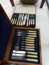 Two cased cutlery sets