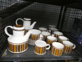 Cage containing Midwinter crockery