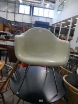 Moulded fibreglass armchair after Charles Eames