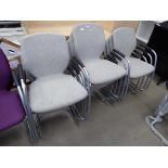 13 grey cloth stacking chairs