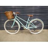 Turquoise girls bike with front basket