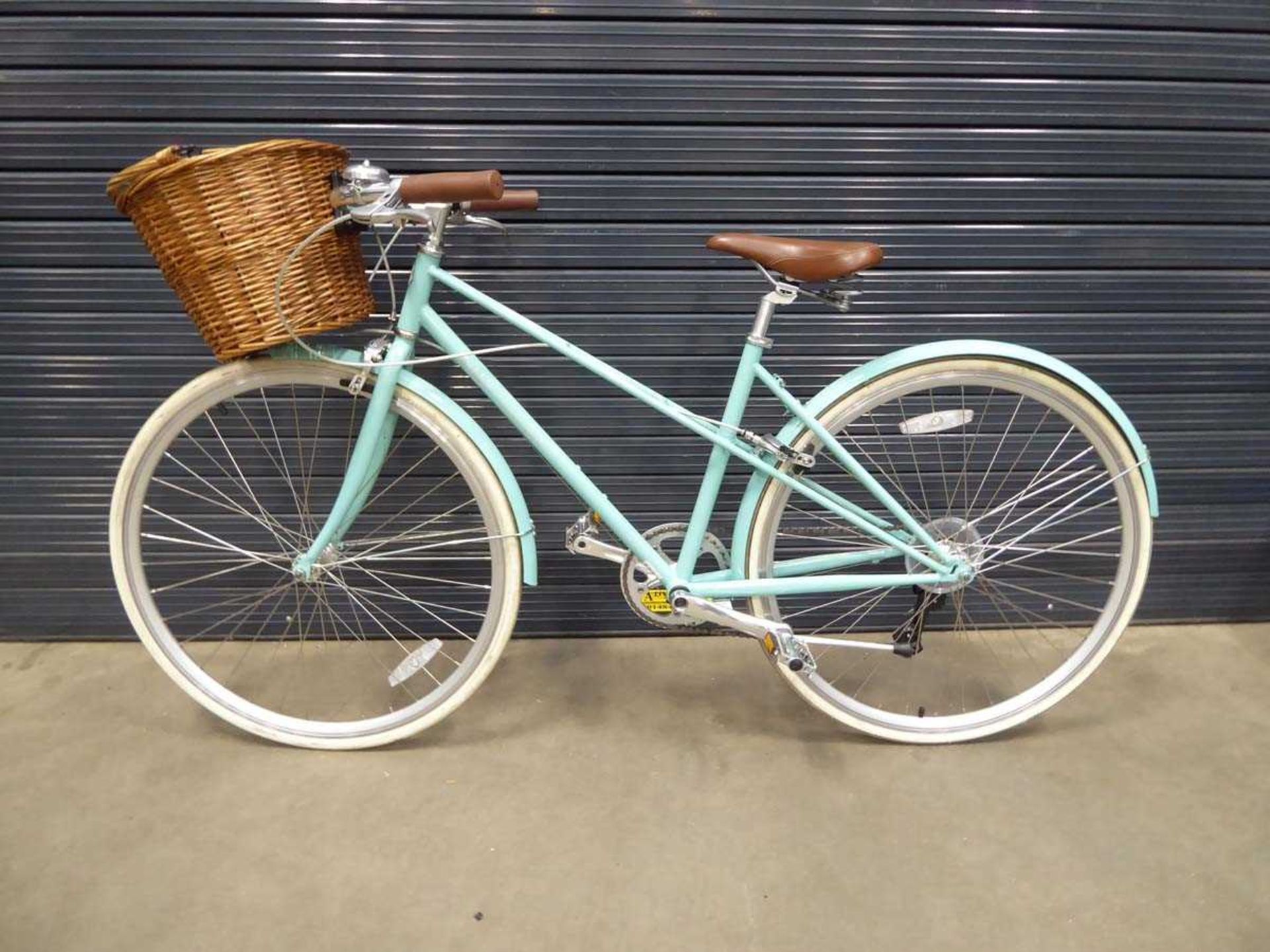 Turquoise girls bike with front basket