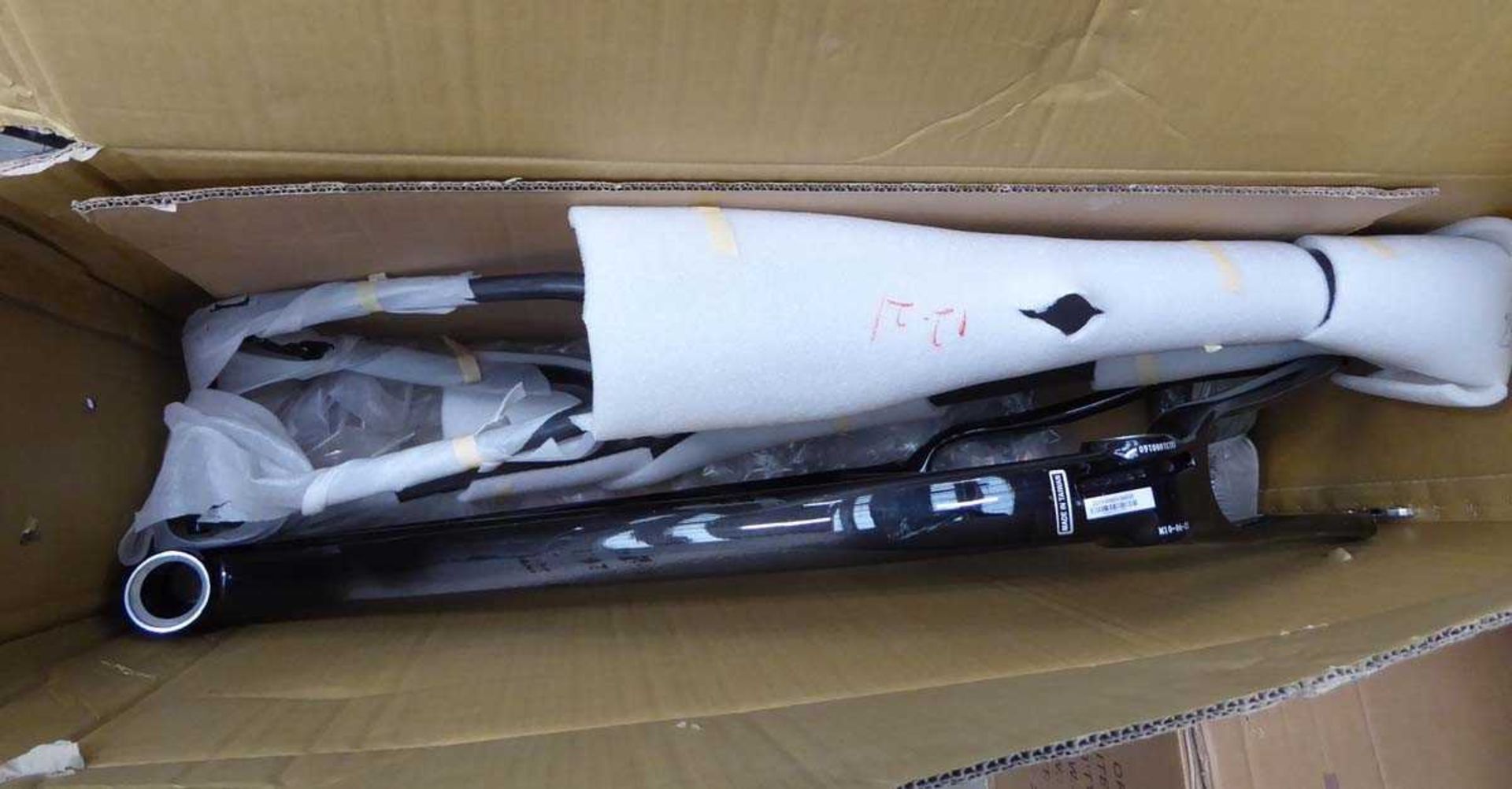 Box containing two carbon fiber bike frames