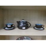 Pair of Denby cups and saucers plus a teapot