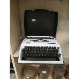 Vintage Adler travelling typewriter