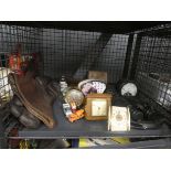 Cage containing binoculars, leather motorcycle gloves, alarm clocks and loose die cast toys