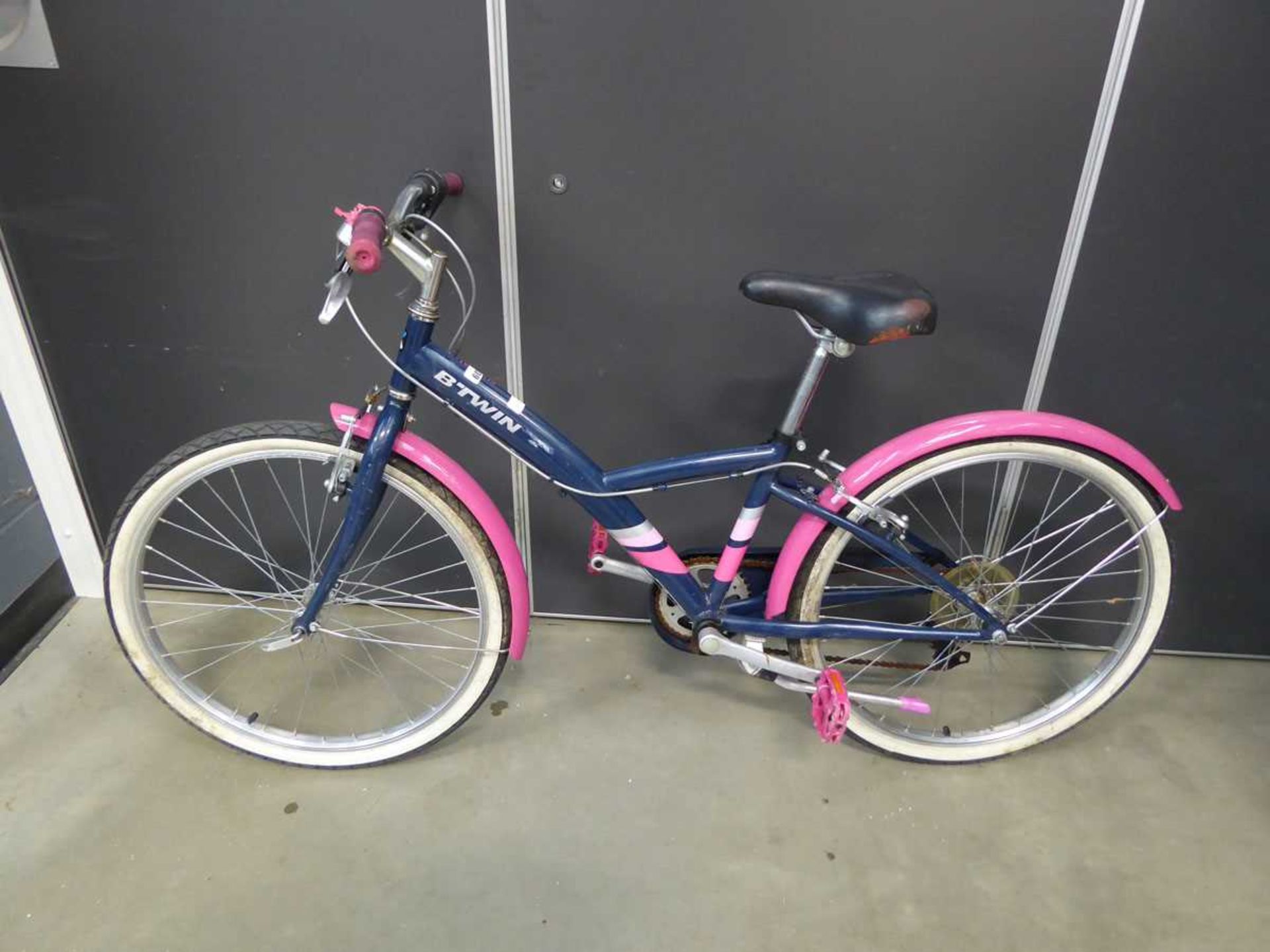 B-Twin child's bike in blue and pink