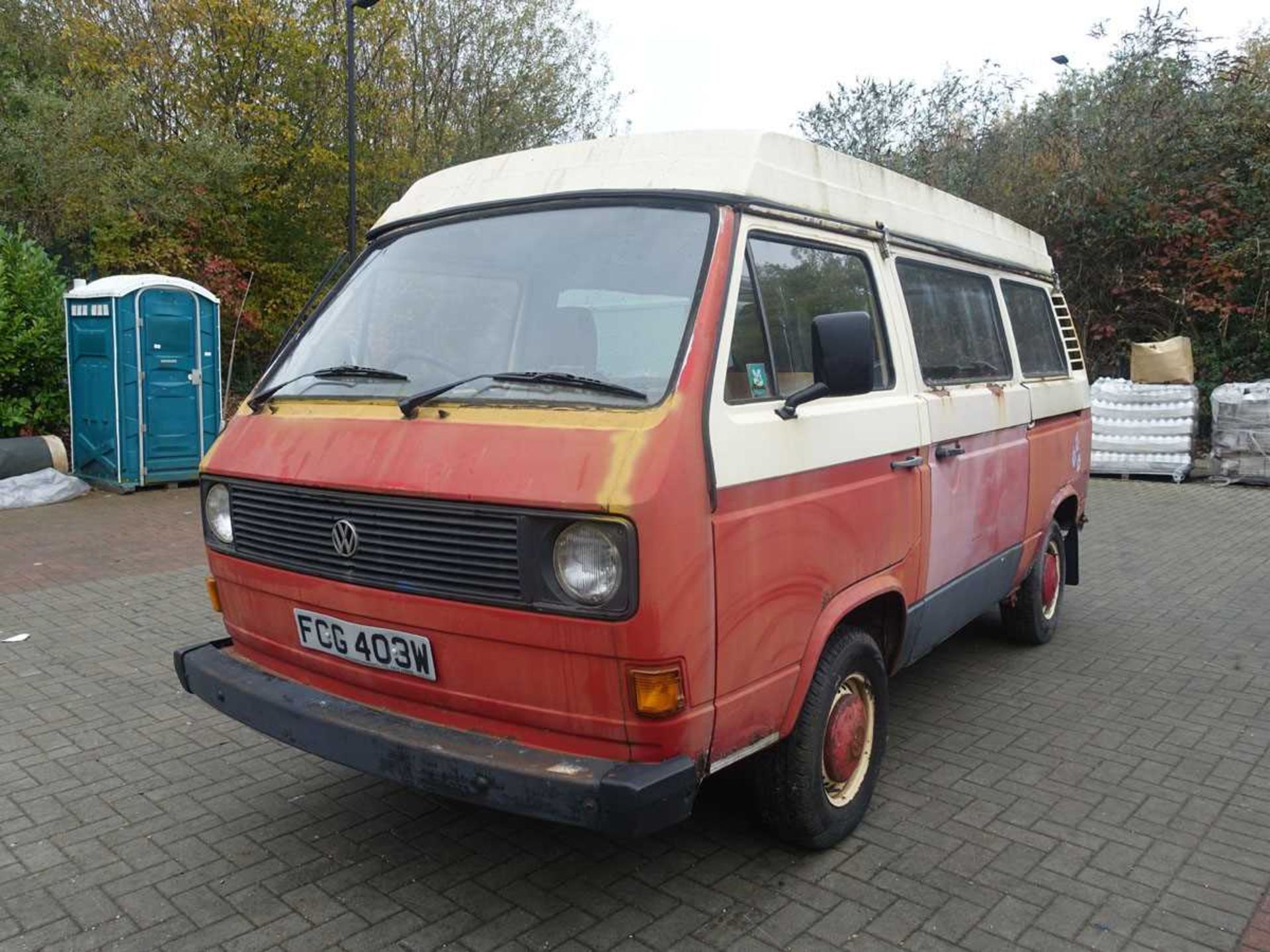 (FCG 403W) Volkswagen T25 Camper Van, Devon Moonraker in red and cream, with original gas fridge