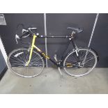 Raleigh racing bike in black and yellow