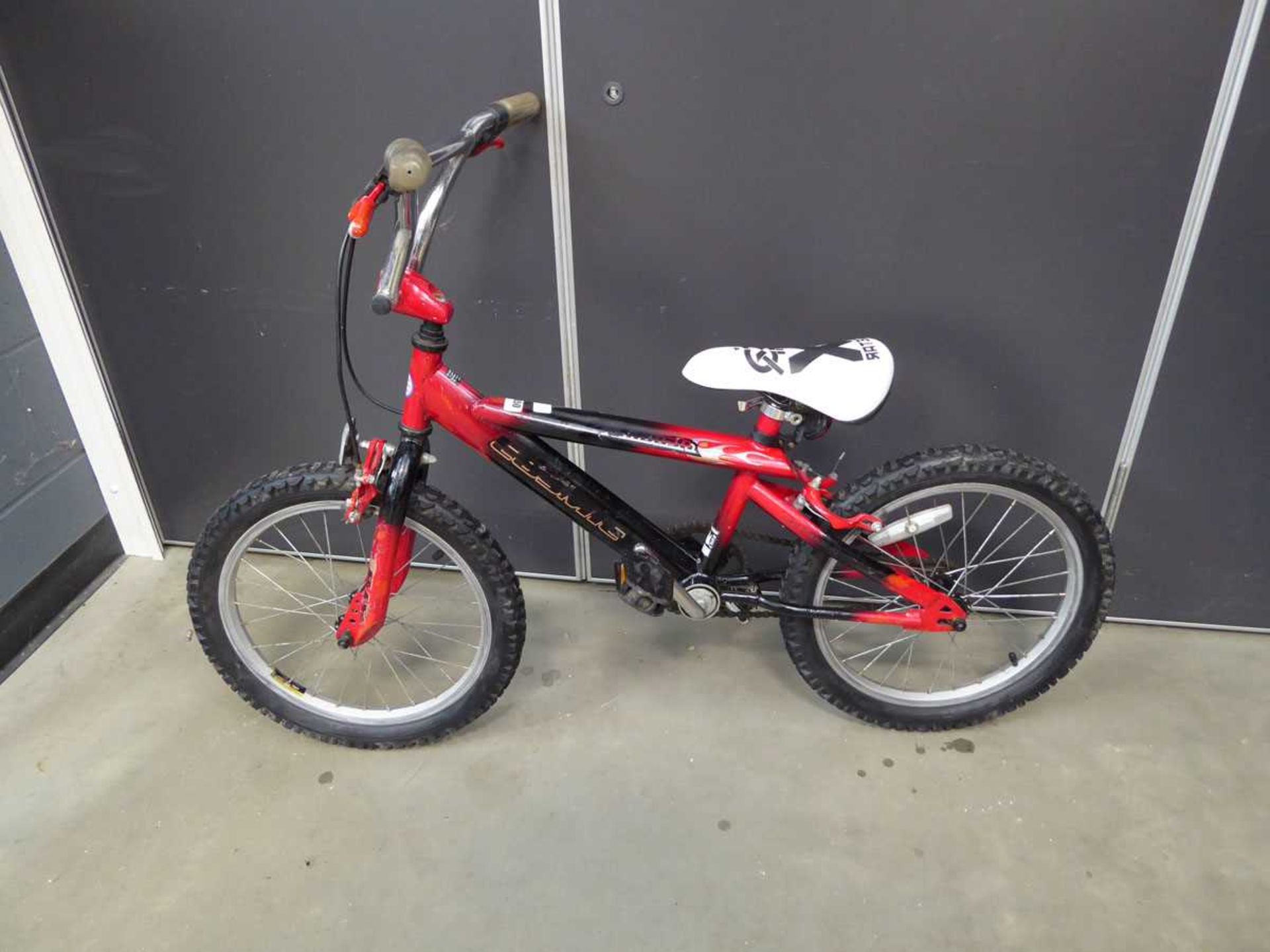 Child's BMX bike in red and black