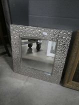 Square mirror in pebbledash frame