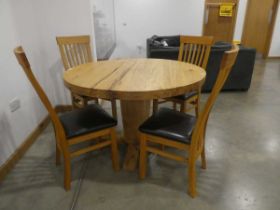 Circular spirit of wood dining table plus four chairs