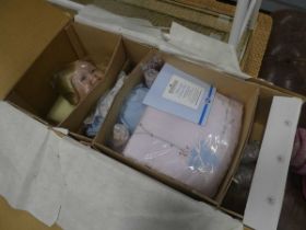 2 boxed porcelain dolls