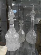 Four decanters with stoppers