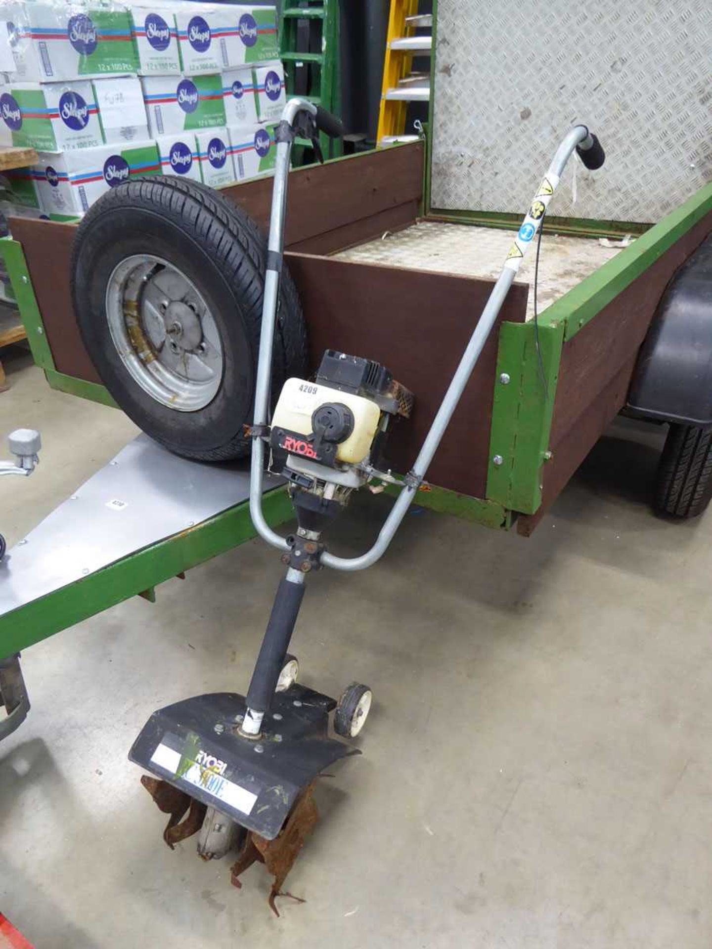 Small Ryobi petrol powered rotovator